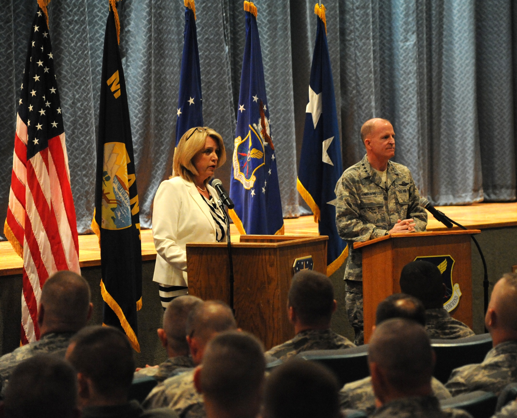 Secretary of the Air Force Deborah Lee James and Lt. Gen. Stephen Wilson, commander of Air Force Global Strike Command, address Airmen of Malmstrom Air Force Base during an all call July 1 at the base auditorium. James and Wilson spoke about Airmen-generated Force Improvement Program initiatives, which are empowering Airmen and creating a culture of continuous improvement. (U.S. Air Force photo/ Airman 1st Class Joshua Smoot)