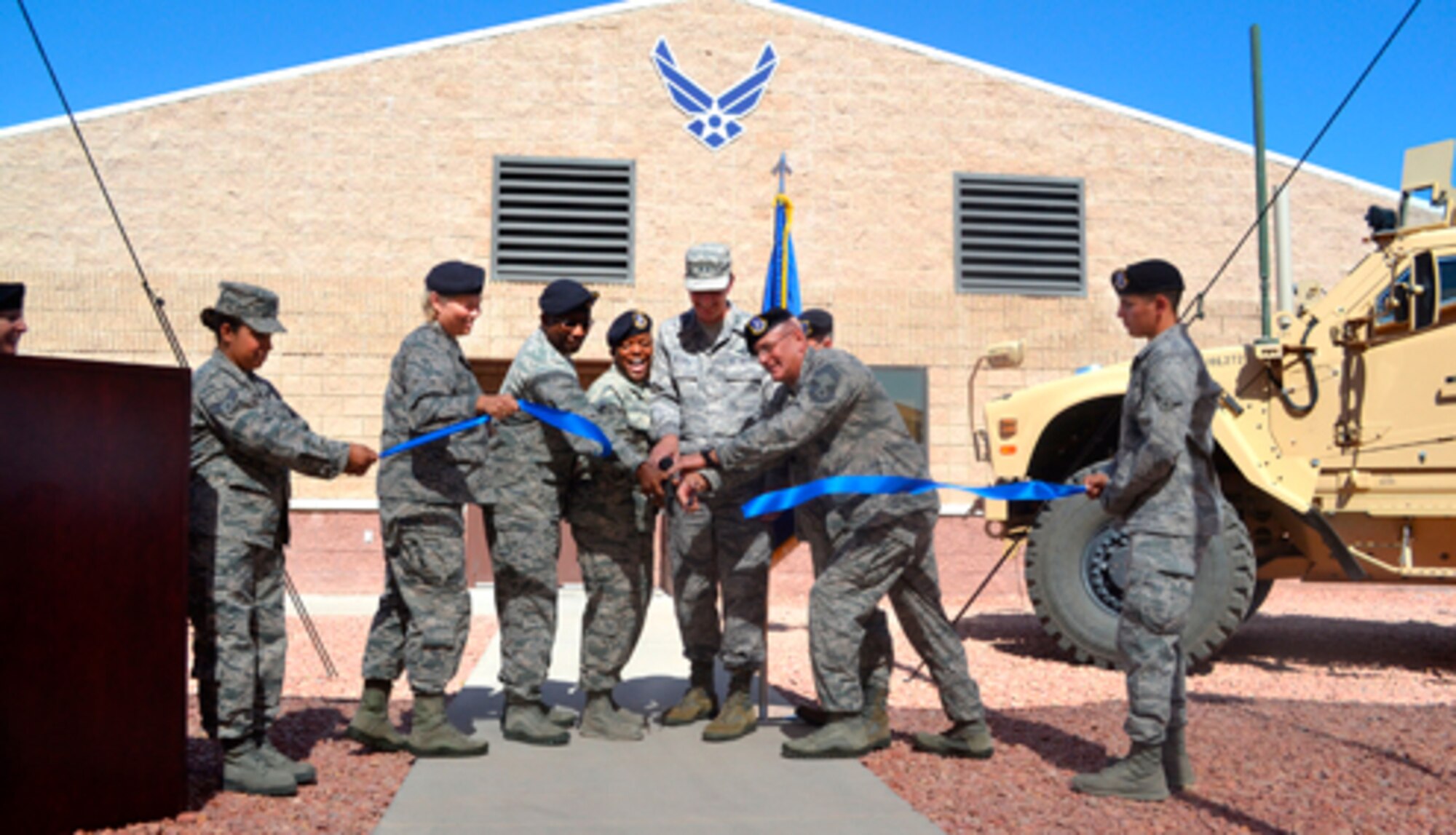 Air Force security forces now have one consolidated ground combat readiness center after the Desert Defender Ground Combat Readiness Training Center ribbon-cutting ceremony at Fort Bliss, Texas, July 3, 2014., All Air Force security forces, be they active-duty Air Force, Air Reserve Command or Air National Guard, will use the center. Air Force officials partnered with the U.S. Army, and specifically the 1st Armored Division, to create the center. (Courtesy photo)
 