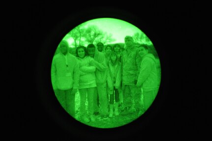 Youth participants receive instruction from members of the Arizona National Guard Civil Operations team on how to use night vision goggles, Jan. 13, 2012.