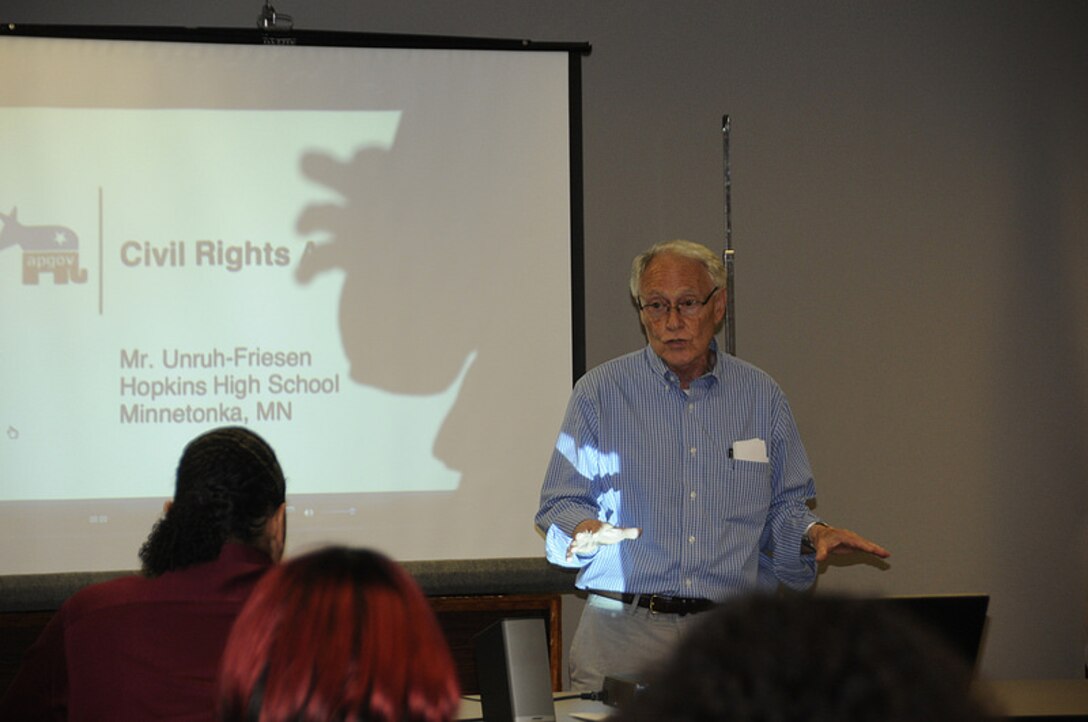 Mr. Gerald Keil, retired EEOC attorney, speaks to a crowd of about 50 federal workers about his experiences as one of the pioneers in the EEOC shortly after the signing of the Civil Rights Act of 1964.