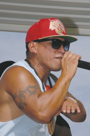 Vernon Cruz, lead vocalist with Unbreak-able Bloodline, performs at Marine Corps Logistics Base Albany’s annual Independence Day celebration playing a mix of hip-hop, rock, reggae and jazz, June 27.