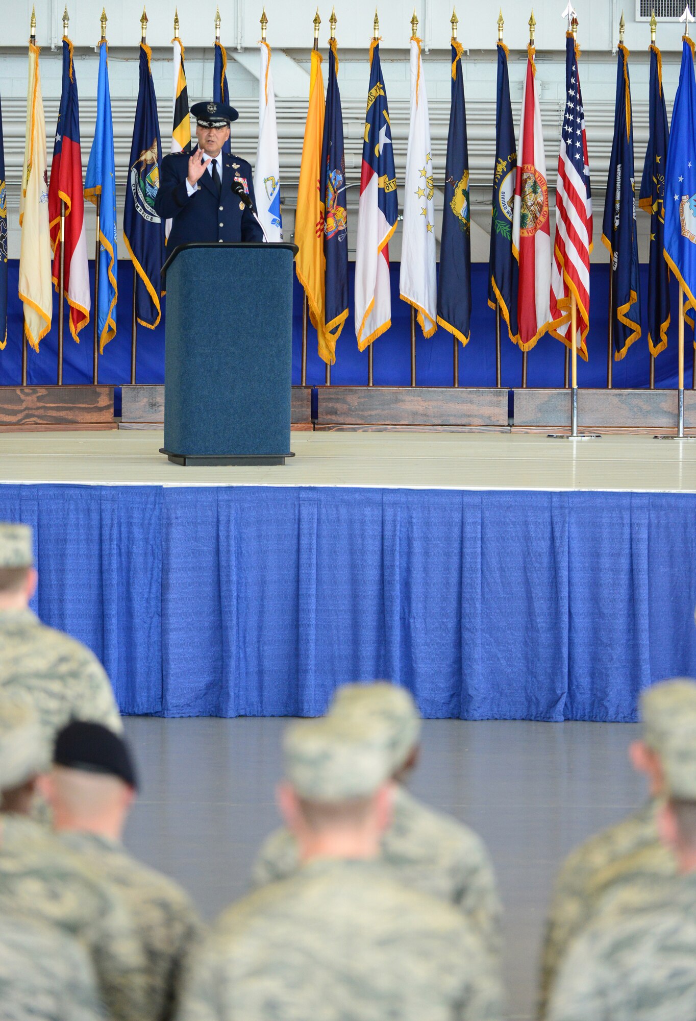 Lt. Gen. Bradley A. Heithold speaks to Air Commandos for the first time as the commander of Air Force Special Operations Command during a change of command ceremony held at Hurlburt Field, Fla., July 3, 2014.  Heithold becomes the AFSOC commander after a three-year tour as the headquarters U.S. Special Operations Command vice commander in Washington, D.C.  (U.S. Air Force photo by Master Sgt. Steven Pearsall)