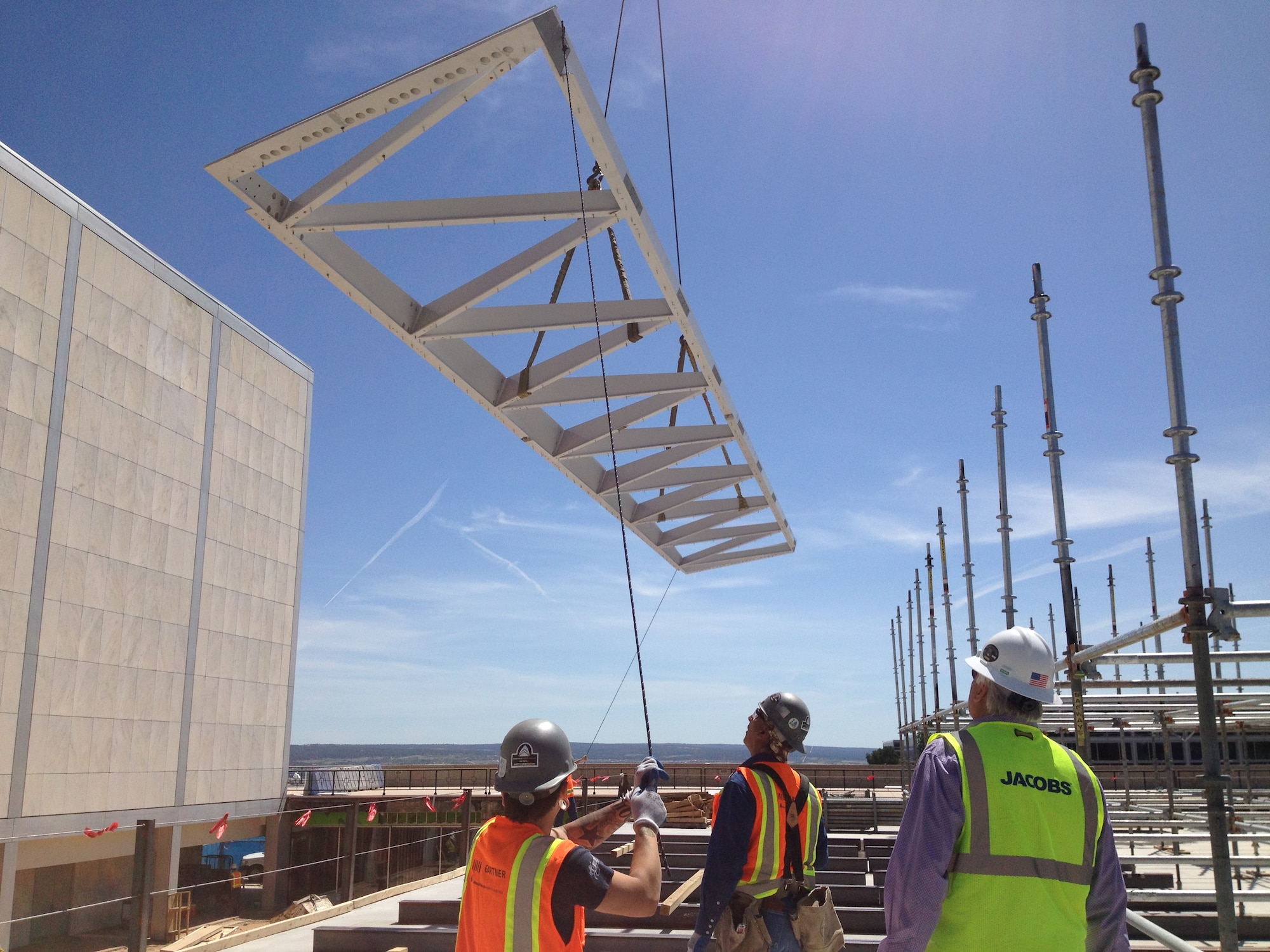 U.S. AIR FORCE ACADEMY, Colo. - The first tower trusses recently arrived at the Academy’s Center for Character and Leadership Development, initiating construction of the center’s symbolic glass skylight tower. (Photo by Russell Henderer)