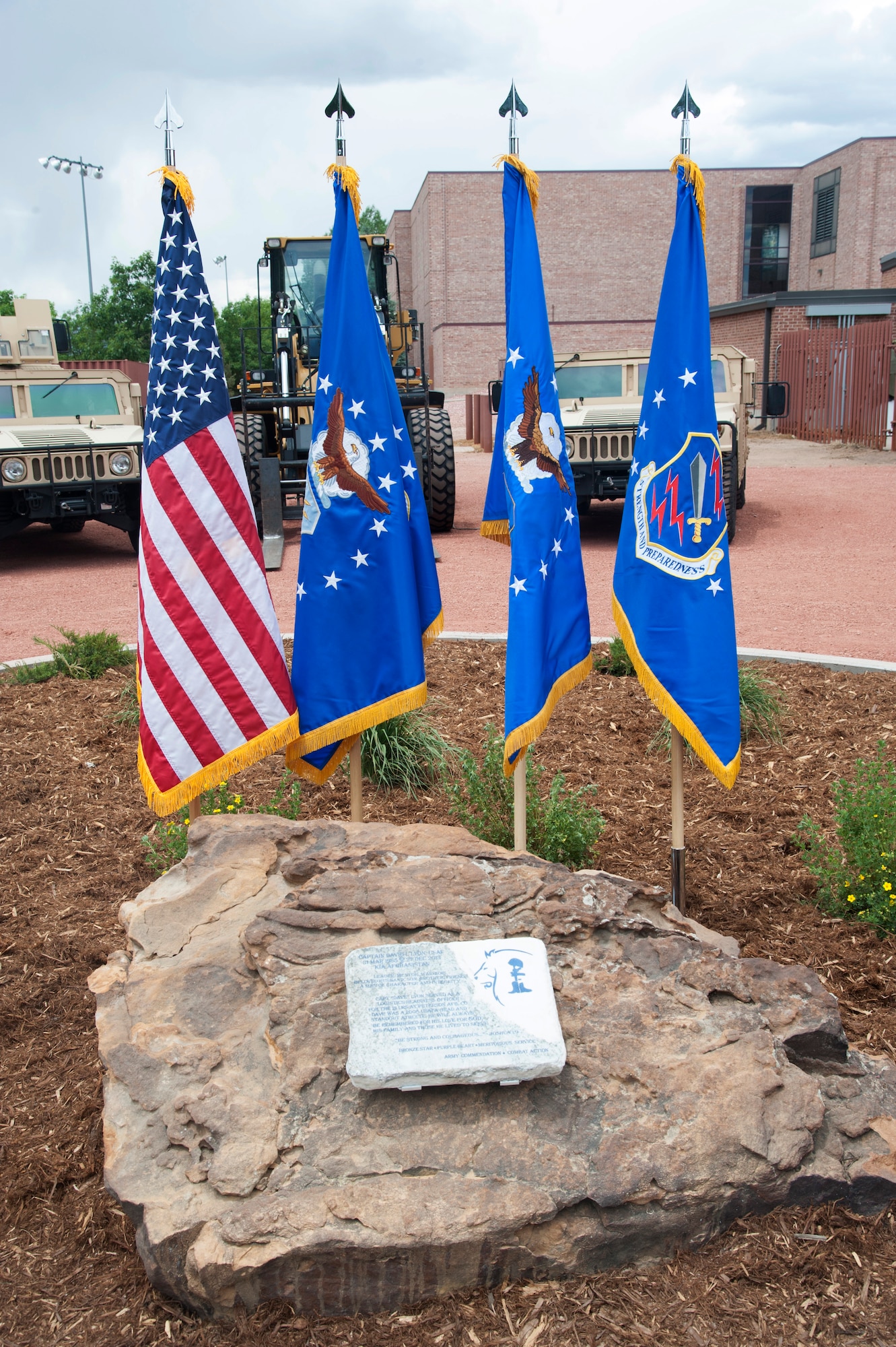 PETERSON AIR FORCE BASE, Colo. – The plaque at the new Capt. David Lyon Memorial Park, located behind the base gym and bowling alley, reads: “Leader, mentor, warrior, beloved husband, son, brother, friend, a man of character and integrity. Capt. Dave Lyon served as the logistics readiness officer for the 21st LRS at Peterson Air Force Base, CO. Dave was a 2008 USAFA grad and stand-out athlete. He will always be remembered for his love for God, his family and those he lived to serve.” Lyon was killed in action Dec. 27, 2013, in Afghanistan. (U.S. Air Force photo/Robb Lingley)
