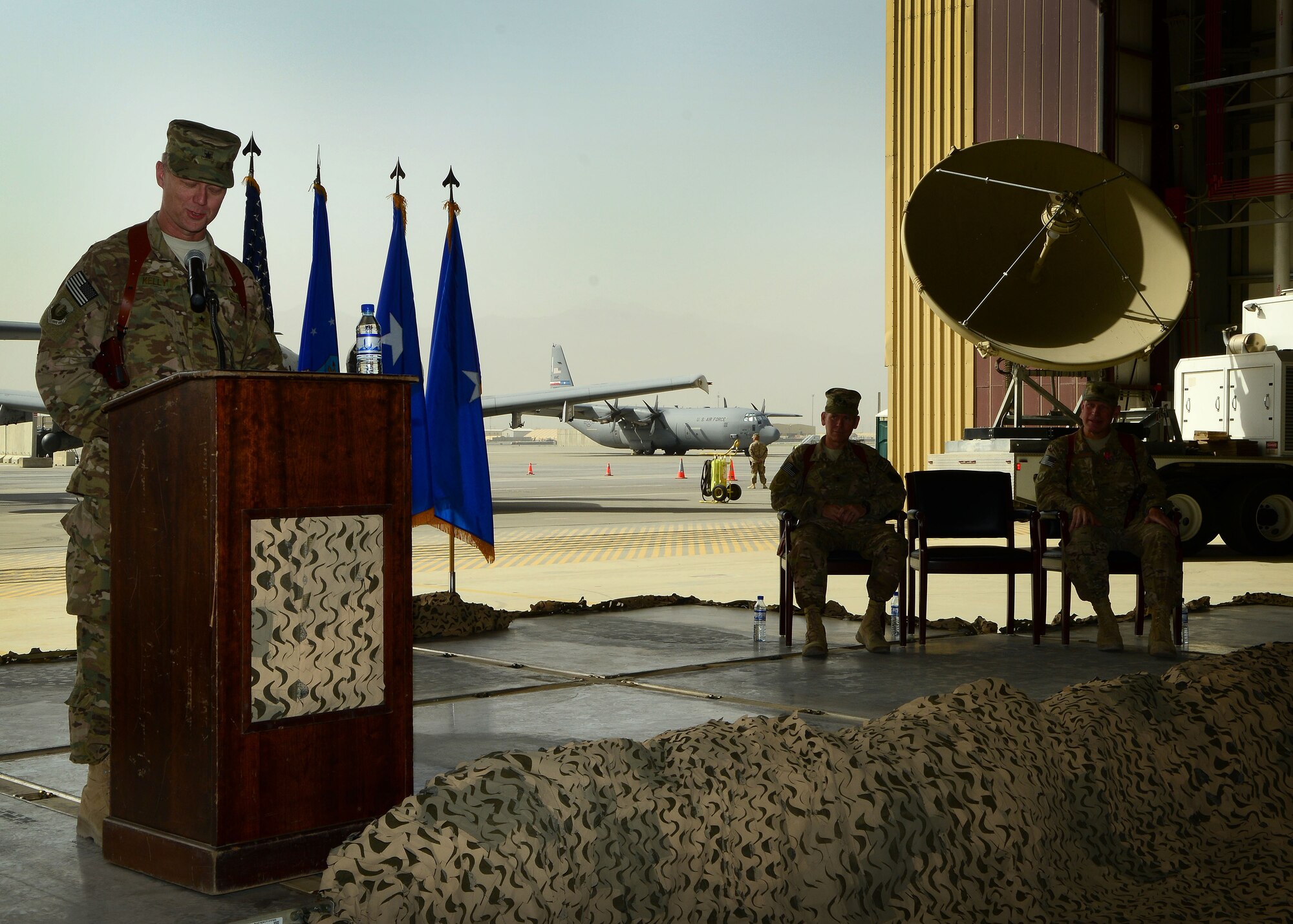 U.S. Air Force Brig. Gen. Mark Kelly, 455th Air Expeditionary Wing commander addresses service members during a change of command ceremony at Bagram Airfield, Afghanistan July 3, 2014.  Kelly was the commander for the 345th Fighter Wing at Eielson Air Force Base, Alaska.  (U.S. Air Force photo by Staff Sgt. Evelyn Chavez/Released)