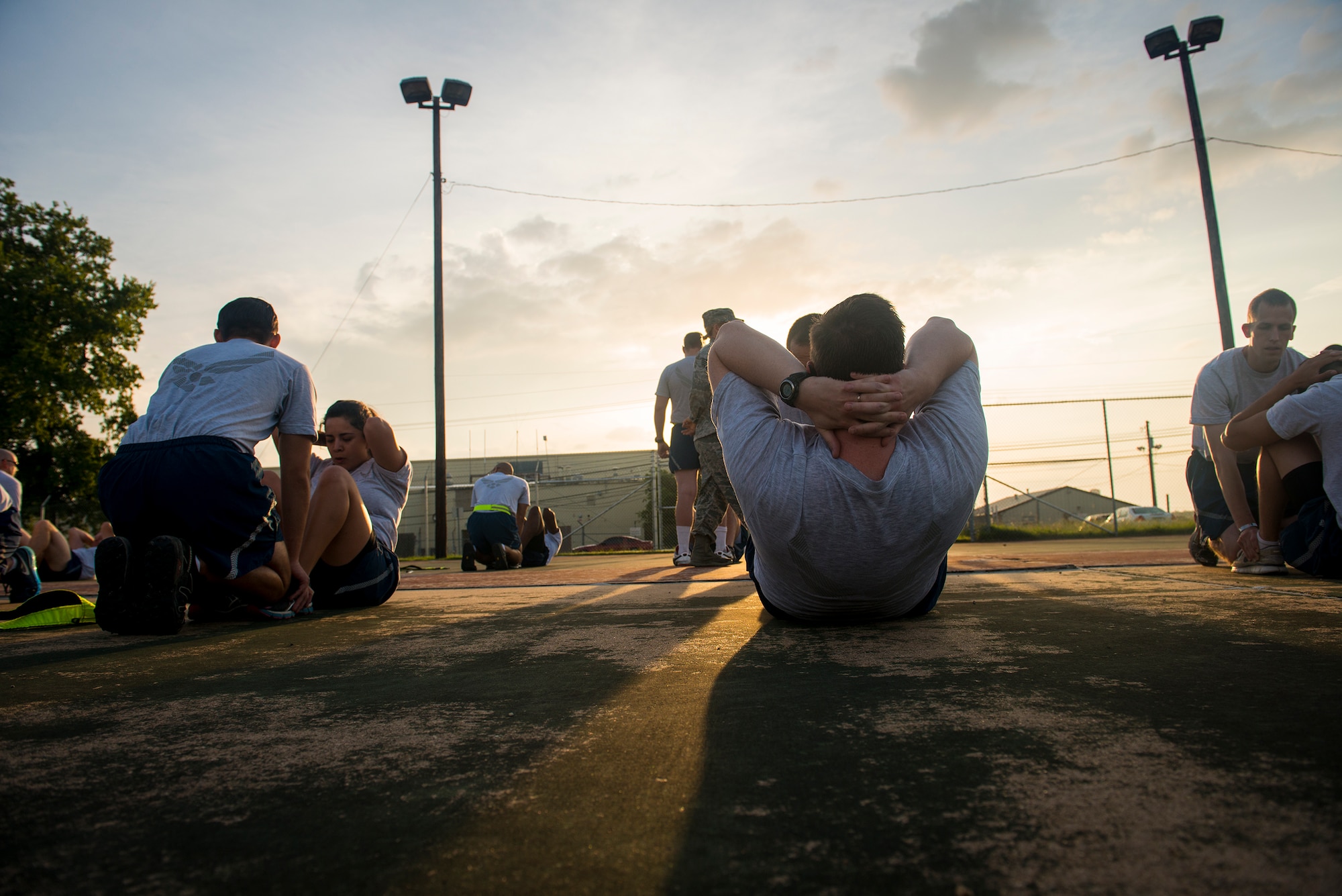 Airmen from the 3d Weather Squadron conduct an Army physical fitness test at Fort Hood, Texas, June 24, 2014. The test was part of a commander’s challenge following a change of command ceremony. (U.S. Air Force photo by Airman 1st Class Ryan Callaghan/Released)