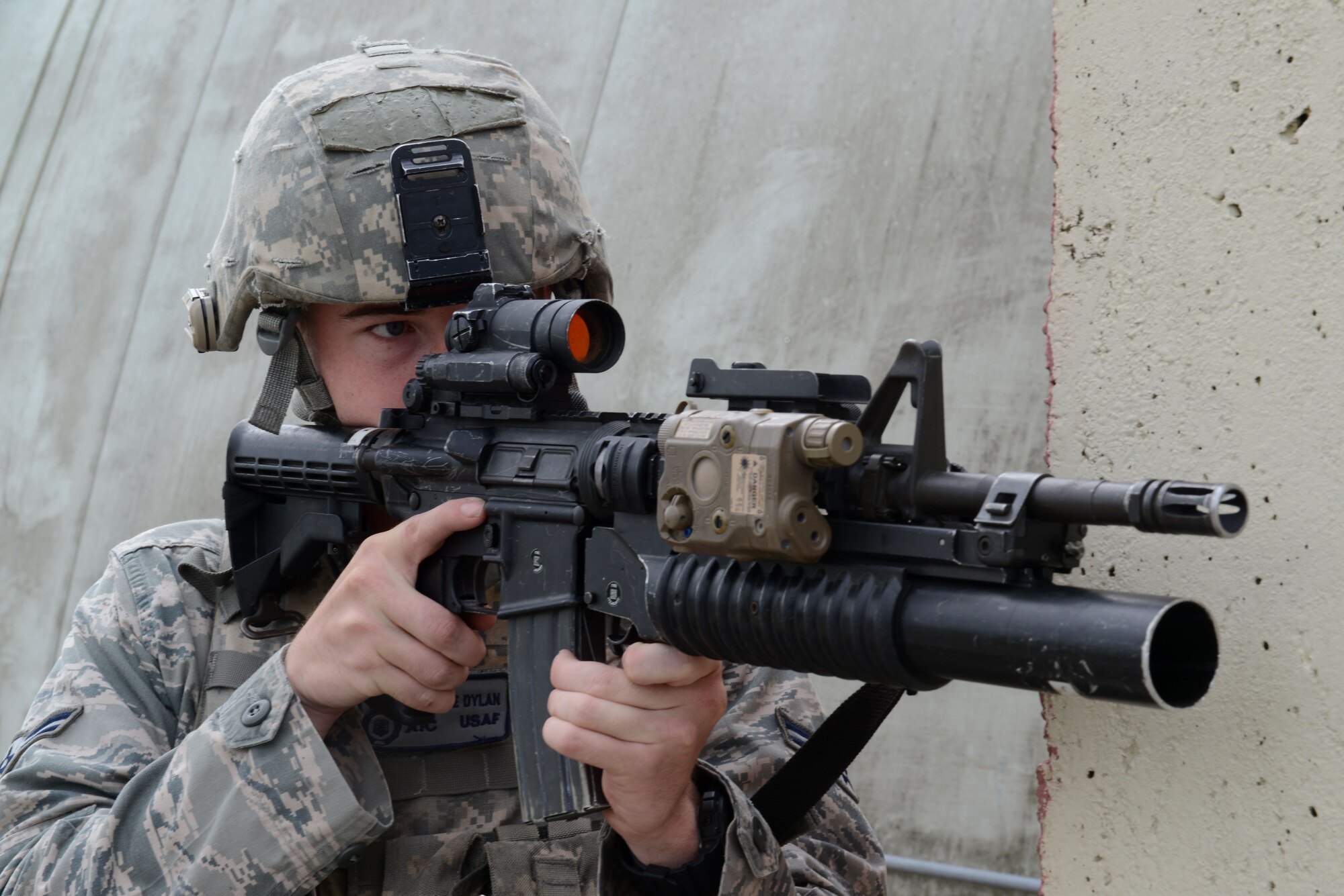 Airman 1st Class Dylan Dinsmore, 31st Security Forces Squadron security response team member, provides simulated cover during a concentrated exercise, July 1, 2014, at Aviano Air Base, Italy. The 31st Security Forces Squadron is entrusted with the more than 8,000 lives who work and live here. (U.S. Air Force photo/Airman 1st Class Ryan Conroy) 