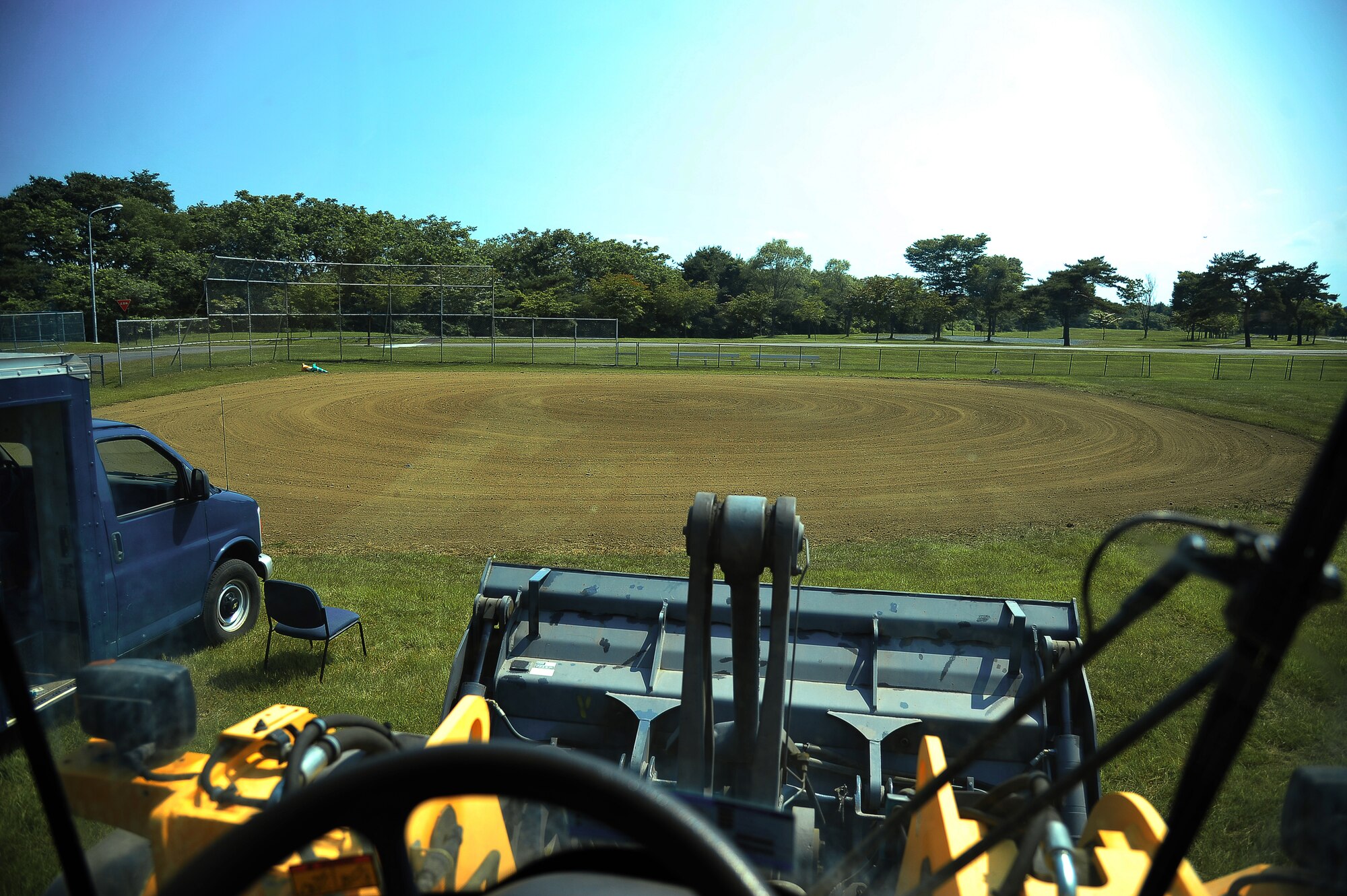The Leftwich Park baseball field is now ready for use following a final touch-up by the 35th Civil Engineer Squadron at Misawa Air Base, Japan, July 2, 2014. The 35 CES followed up on a volunteer initiative by Airman Leadership School 14-Echo Class students to renovate the Leftwich Park baseball field by providing equipment and the last renovation touch-ups to the field. (U.S. Air Force photo/Senior Airman Jose L. Hernandez-Domitilo)