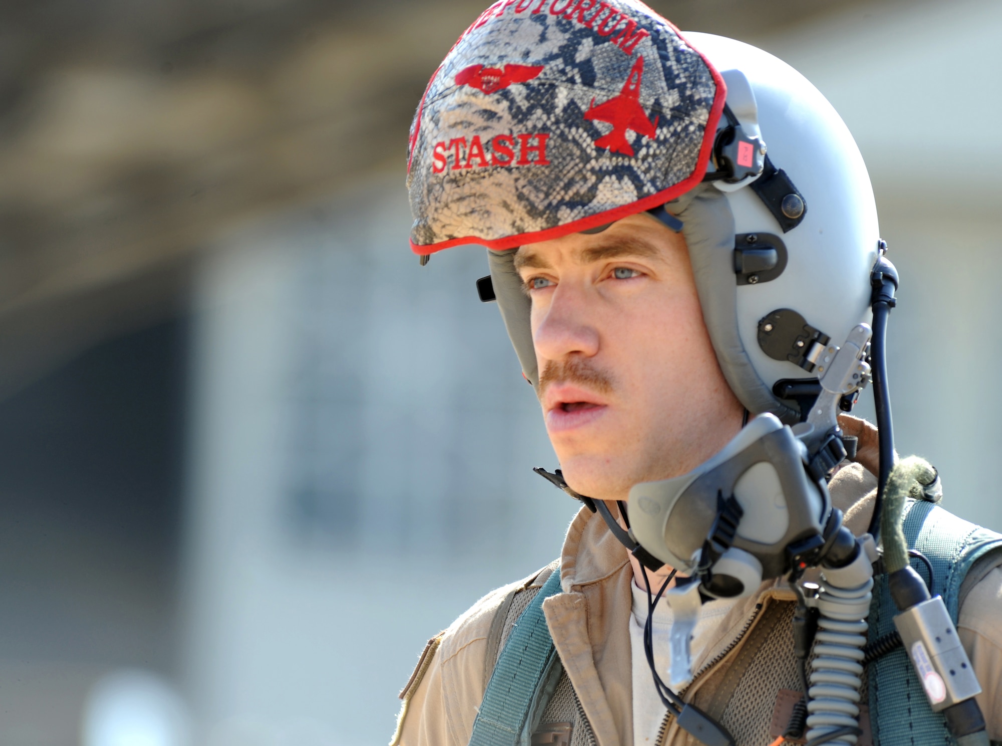 U.S. Air Force Capt. Dustin Carey, an F-16 Fighting Falcon pilot with the 13th Fighter Squadron at Misawa Air Base, Japan, participates in Exercise Eager Tiger May 12, 2014, at an air base in northern Jordan. Carey is the fourth generation of his family to serve in the U.S. military. (U.S. Air Force photo by Staff Sgt. Brigitte N. Brantley/Released)