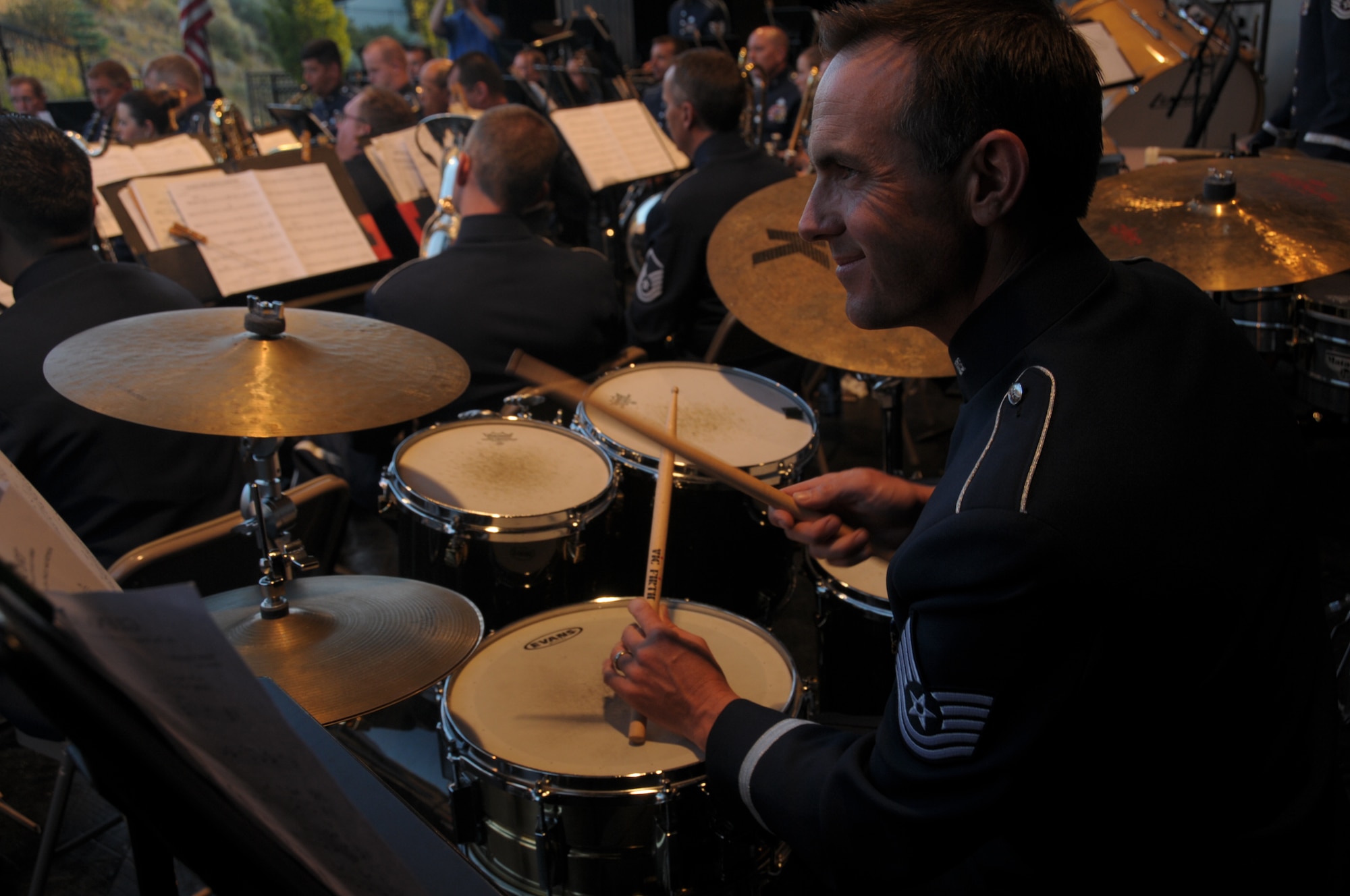 U.S. Air Force Technical Sgt. Chad Mitchell with the Air National Guard Band of the West Coast performs at the Draper City Amphitheater in Draper City, Utah on July 1, 2014. (U.S. Air National Guard photo by Airman 1st Class Madeleine Richards/Released)


