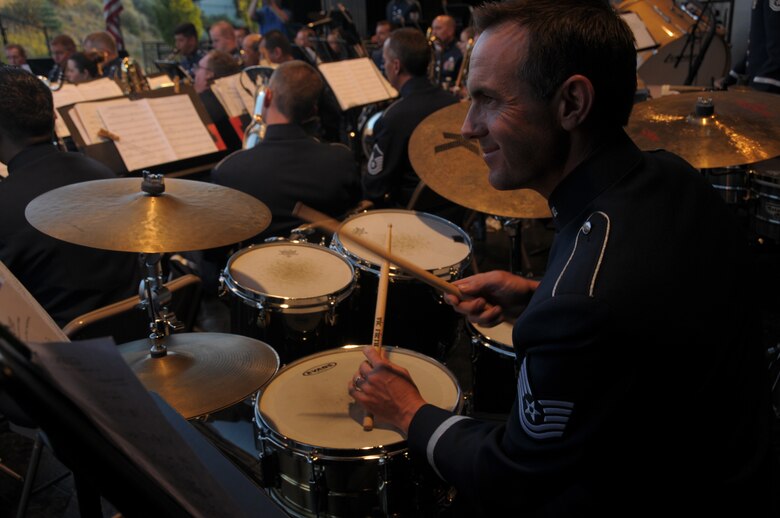 U.S. Air Force Technical Sgt. Chad Mitchell with the Air National Guard Band of the West Coast performs at the Draper City Amphitheater in Draper City, Utah on July 1, 2014. (U.S. Air National Guard photo by Airman 1st Class Madeleine Richards/Released)


