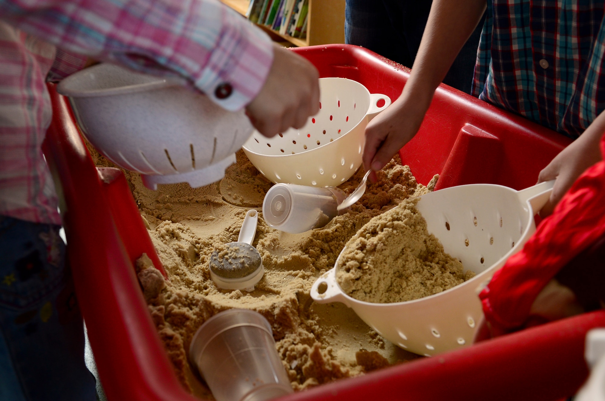 Year two students at Guildhall Feoffment Primary School, in Bury St. Edmunds, pan for gold during America Week, July 2, 2014. The students learned about various parts of American history, such as the Gold Rush of 1848, through hands-on activities. (U.S. Air Force photo by Airman 1st Class Dawn M. Weber/Released)