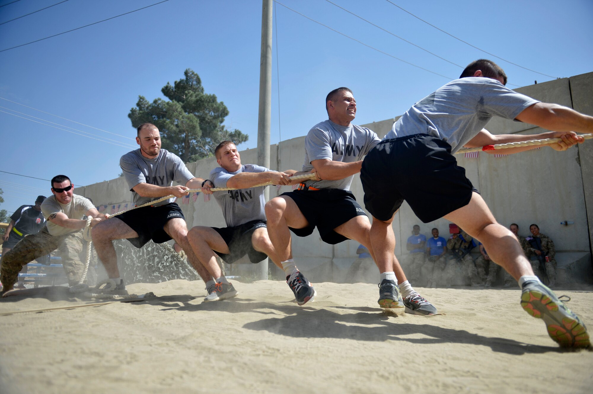 U.S. Army soldiers play a game of tug-of-war during a Fourth of July celebration at Bagram Airfield, Afghanistan July 4, 2014.  The event was a team effort by the U.S. Air Force and Army to entertain all service members.   (U.S. Air Force photo by Staff Sgt. Evelyn Chavez/Released)