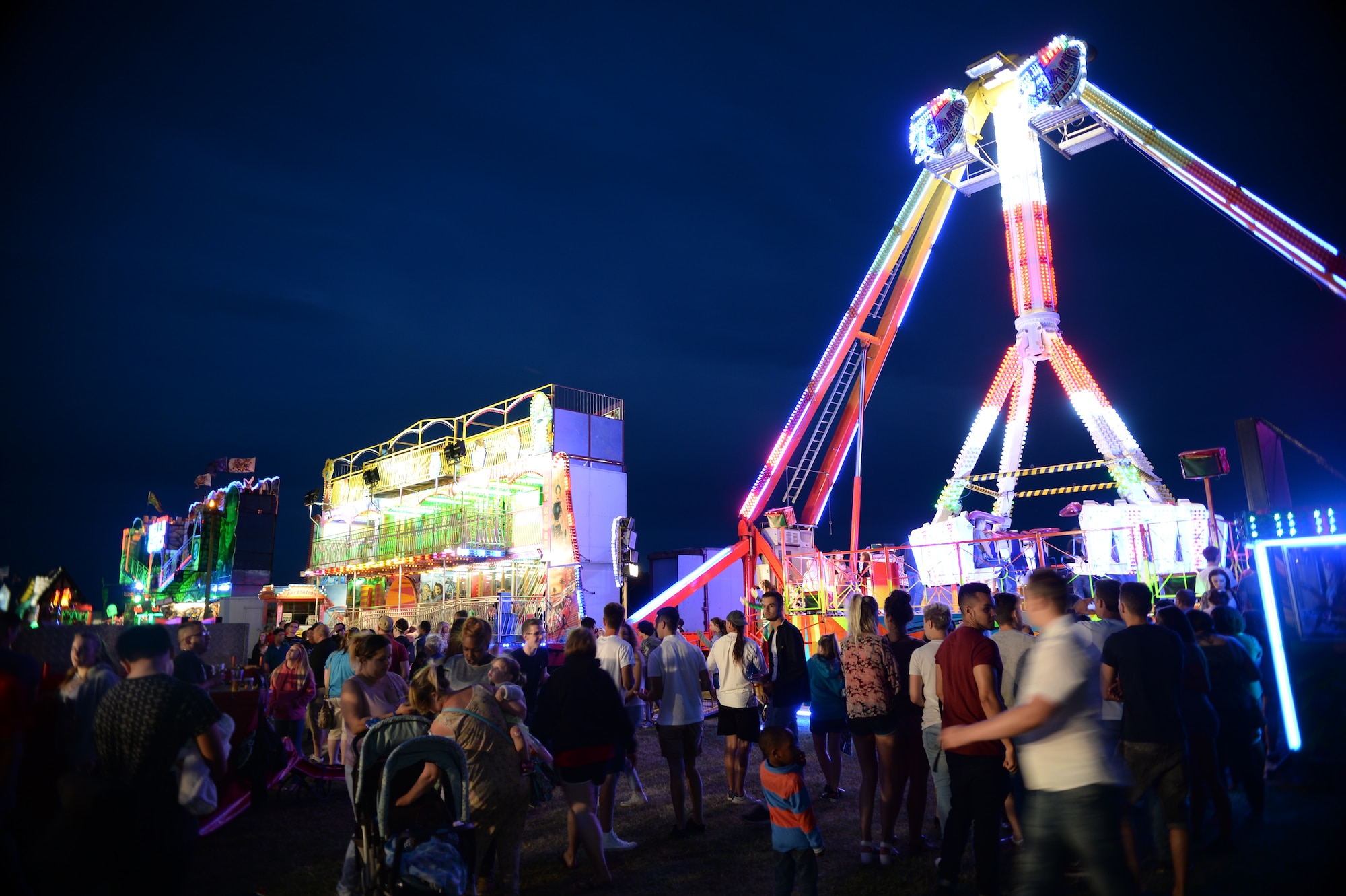 Royal Air Force Feltwell, England, hosted a celebration July 4, 2014. The free, public event featured many events and activities, including rides, games, food booths, an aerial demonstration from the RAF Red Arrows, and a fireworks display. (U.S. Air Force photo by Staff Sgt. Emerson Nuñez/Released)