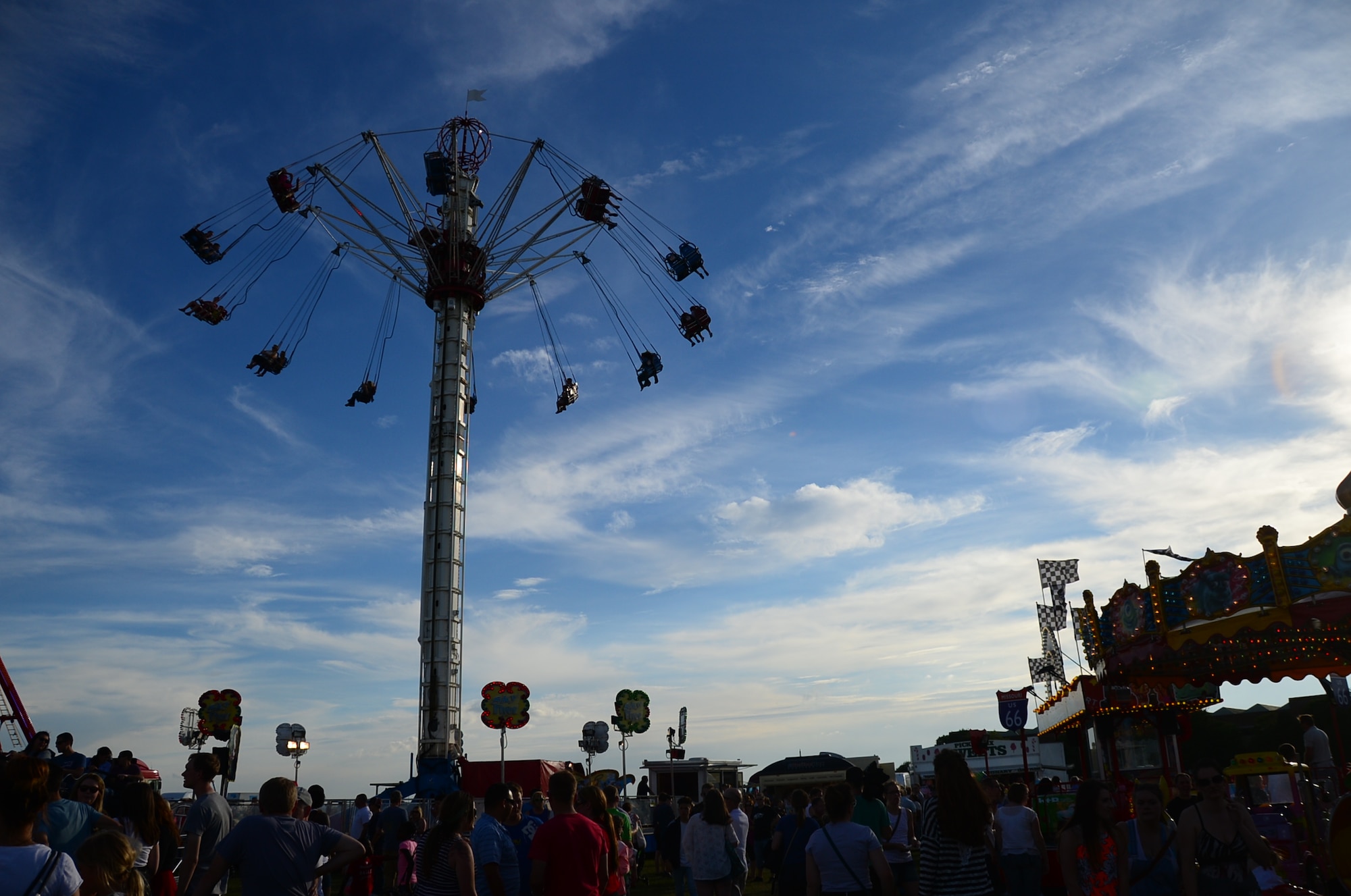 Royal Air Force Feltwell, England, hosted a celebration July 4, 2014. The free, public event featured many events and activities, including rides, games, food booths, an aerial demonstration from the RAF Red Arrows, and a fireworks display. (U.S. Air Force photo by Airman 1st Class Erin O’Shea/Released)