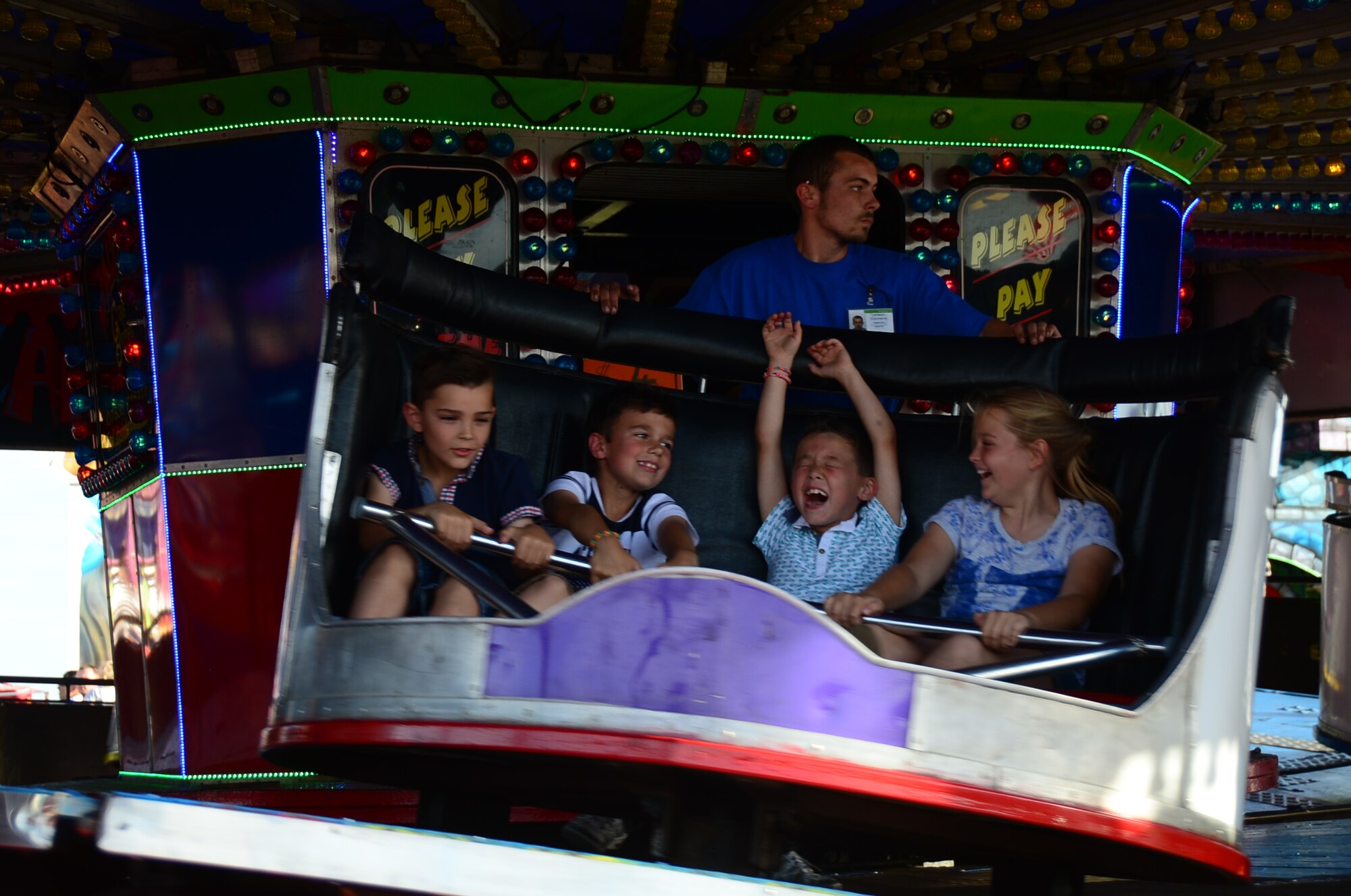 Royal Air Force Feltwell, England, hosted a celebration July 4, 2014. The free, public event featured many events and activities, including rides, games, food booths, an aerial demonstration from the RAF Red Arrows, and a fireworks display. (U.S. Air Force photo by Airman 1st Class Erin O’Shea/Released)