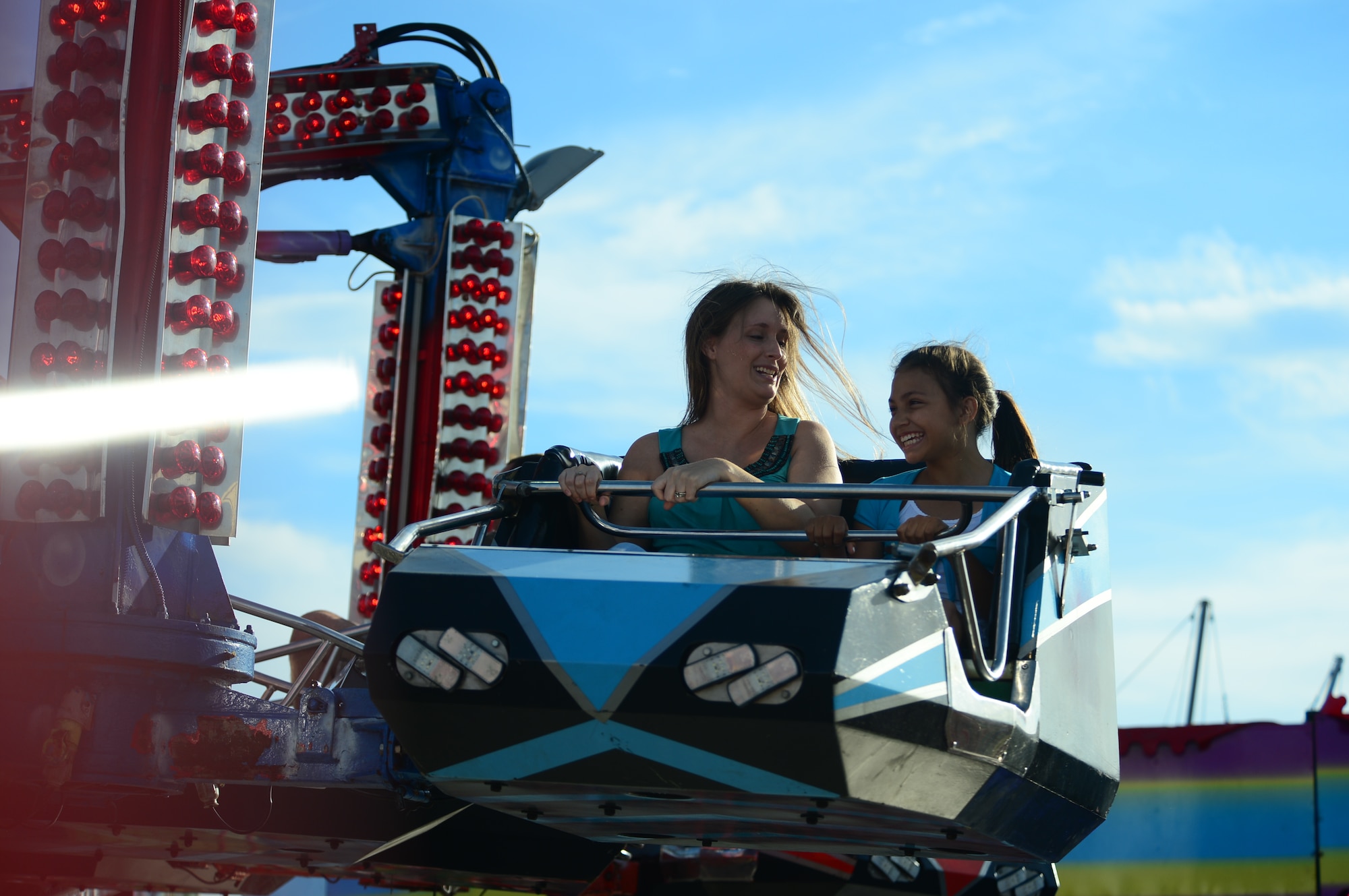 Royal Air Force Feltwell, England, hosted a celebration July 4, 2014. The free, public event featured many events and activities, including rides, games, food booths, an aerial demonstration from the RAF Red Arrows, and a fireworks display. (U.S. Air Force photo by Airman 1st Class Erin O’Shea/Released)