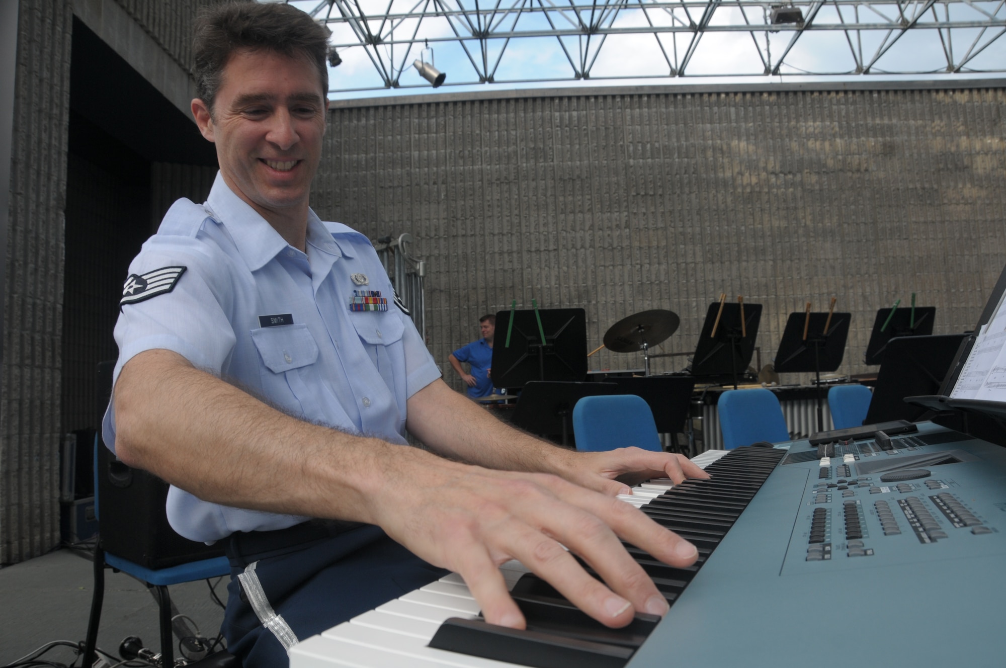 U.S. Air Force Staff Sgt. Rich Smith with the Air National Guard Band of the West Coast performs at the Murray City Amphitheater in Murray City, Utah on July 3, 2014. (U.S. Air National Guard photo by Airman 1st Class Madeleine Richards/Released)

