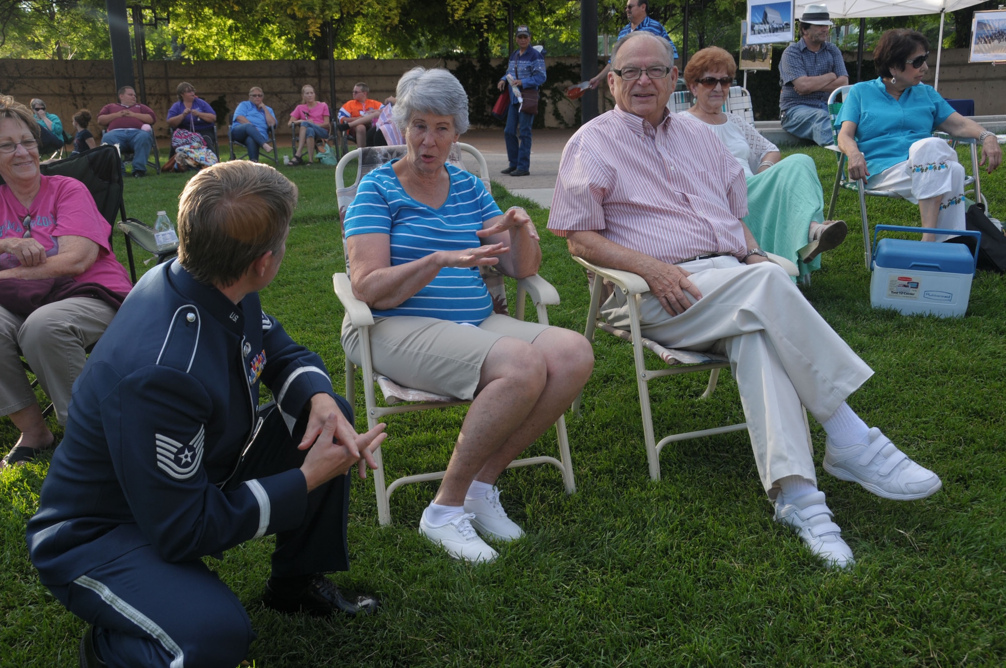 U.S. Air Force Technical Sgt. Jennifer Corbet talks to audience members at the Ogden City Amphitheater in Ogden City, Utah on July 2, 2014. (U.S. Air National Guard photos by Airman 1st Class Madeleine Richards/Released)
