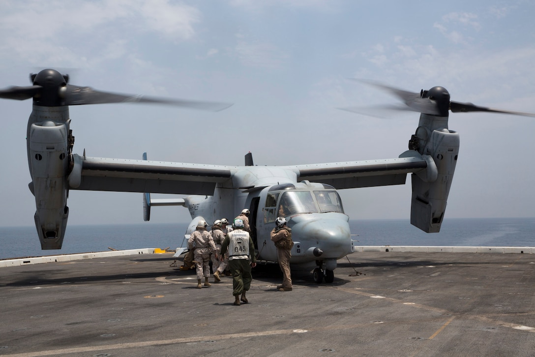 U.S. 5TH FLEET AREA OF RESPONSIBILITY (June 30, 2014) As part of a routine travel plan, U.S. Marines with 22nd Marine Expeditionary Unit (MEU) aboard the amphibious transport dock ship USS Mesa Verde (LPD 19) board an MV-22 Osprey aircraft with Marine Medium Tiltrotor Squadron 263 (VMM 263) (Reinforced). The 22nd MEU is deployed with the Bataan Amphibious Ready Group as a theater reserve and crisis response force throughout U.S. Central Command and the U.S. 5th Fleet area of responsibility. (U.S. Marine Corps photo by Cpl. Manuel A. Estrada/Released)