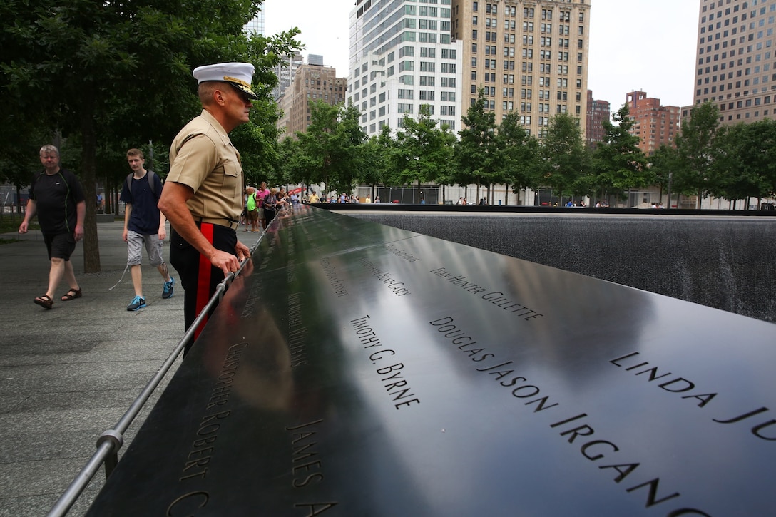 Brigadier Gen. Vincent Coglianese, 1st Marine Logistics Group Commanding General, looks out at the 9/11 World Trade Center Memorial fountain before going on a tour of the 9/11 Museum in New York City, June 25, 2014. Brigadier Gen. Coglianese traveled to New York to officiate Col. James Maxwell’s retirement ceremony Maxwell, a New York State trooper and Marine, served 32 in the Marine Corps. During his career he served in Operation Desert Shield, Operation Desert Storm and Operation Enduring Freedom.