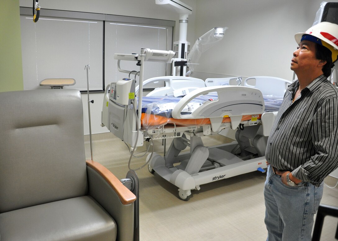 Viet Tran, project engineer for the U.S. Army Corps of Engineers Los Angeles District’s Las Vegas Resident Office Nellis Air Force Base Medical Center Realignment project for the Mike O’Callaghan Medical Center, inspects a renovated labor and delivery room on the medical center’s third floor June 24. The $96 million project, which is scheduled to take three years, is designed to modernize many of the departments in the medical center to provide better service for patients.