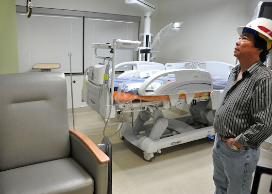 Viet Tran, project engineer for the U.S. Army Corps of Engineers Los Angeles District’s Las Vegas Resident Office Nellis Air Force Base Medical Center Realignment project for the Mike O’Callaghan Medical Center, inspects a renovated labor and delivery room on the medical center’s third floor June 24. The $96 million project, which is scheduled to take three years, is designed to modernize many of the departments in the medical center to provide better service for patients.