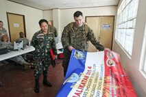 Military Information Support Operations Non-Commisioned Officers (MISO NCO) of the Marine Corps Information Operations Center participate in Balikatan, Legazpi City, Albay Province, Philippines, April 19, 2014. Balikatan is an annual bilateral exercise between the Armed Forces of the Philippines and U.S. Armed Forces designed to strengthen interoperability and country-to-country relations. (U.S. Marine Corps photo by Sgt. Kristofer Atkinson/Released)