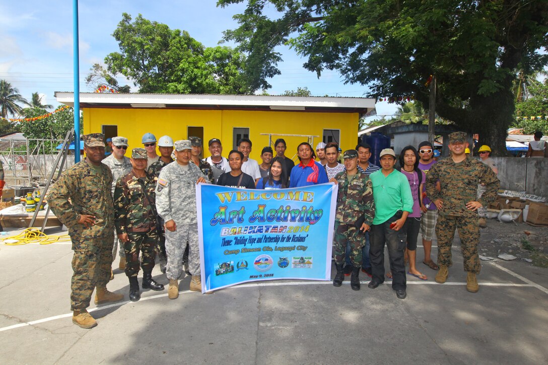 Military Information Support Operations Non-Commisioned Officers (MISO NCO) of the Marine Corps Information Operations Center participate in Balikatan, Legazpi City, Albay Province, Philippines, May 8, 2014. Balikatan is an annual bilateral exercise between the Armed Forces of the Philippines and U.S. Armed Forces designed to strengthen interoperability and country-to-country relations. (U.S. Marine Corps photo by Sgt. Kristofer Atkinson/Released)