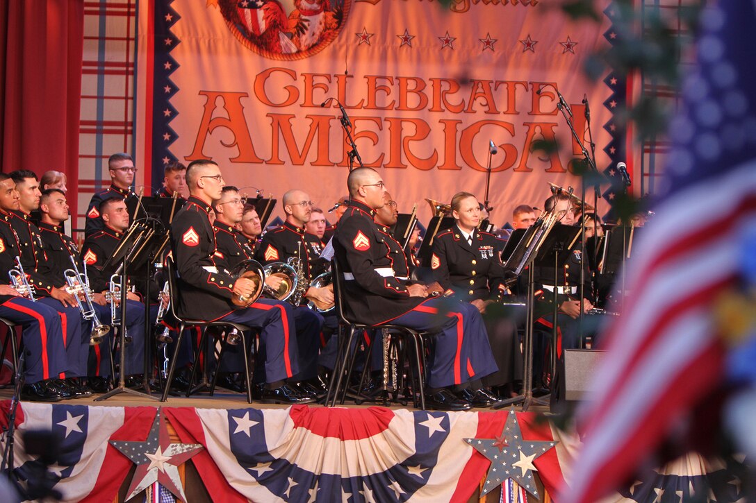 Members of the 3rd Marine Aircraft Wing Band sit on the Big Thunder Ranch Jamboree stage during an Independence Day concert at the Disneyland Resort in Anaheim, Calif., July 4. The musicians were featured in a patriotic concert and several smaller performances throughout the park during the park’s Independence Day celebration. The 3rd MAW Band was invited to perform during the celebration for the third consecutive year.