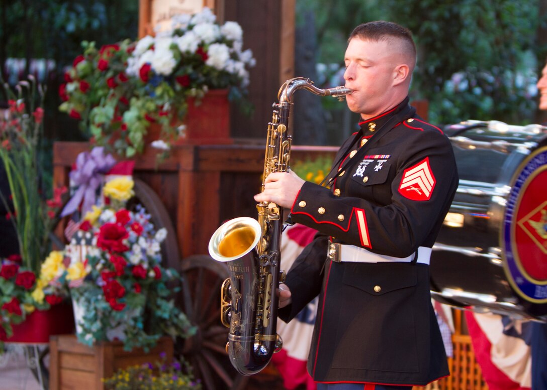 Sgt. Brandon Johnson, musician with the 3rd Marine Aircraft Wing Band, plays saxophone during an Independence Day concert at the Disneyland Resort in Anaheim, Calif., July 4. The band was featured in several performances throughout the day, including a flag-retreat ceremony.