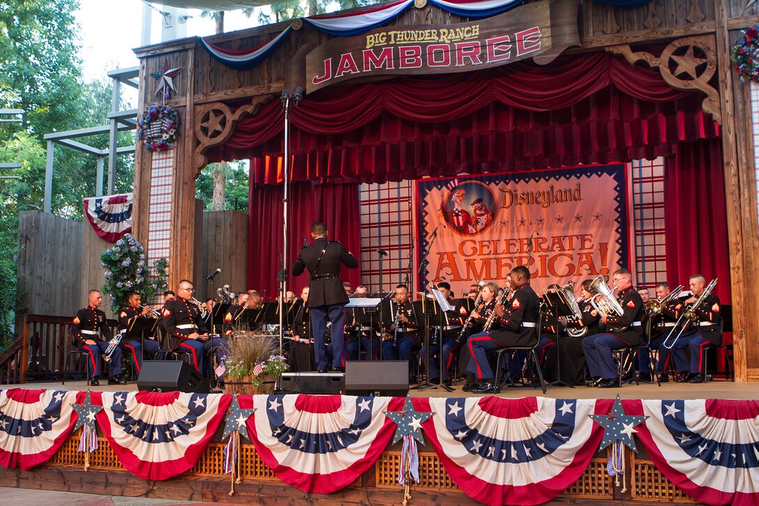 The 3rd Marine Aircraft Wing Band plays during an Independence Day concert at the Disneyland Resort in Anaheim, Calif., July 4. Both the concert band and the party band played at several times and locations throughout the afternoon, followed by a concert at the Big Thunder Ranch Jamboree stage, featuring patriotic and popular music.