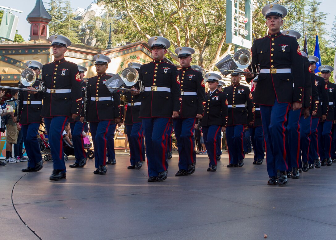 The 3rd Marine Aircraft Wing Band marches down Disneyland Resort’s Main Street to prepare for a flag retreat in Anaheim, Calif., July 4. The theme park featured the band for its third consecutive year as the featured performance on Independence Day at Disneyland. Both the concert band and the party band played at several times and locations throughout the afternoon, followed by a concert at the Big Thunder Ranch Jamboree stage, featuring patriotic and popular music.