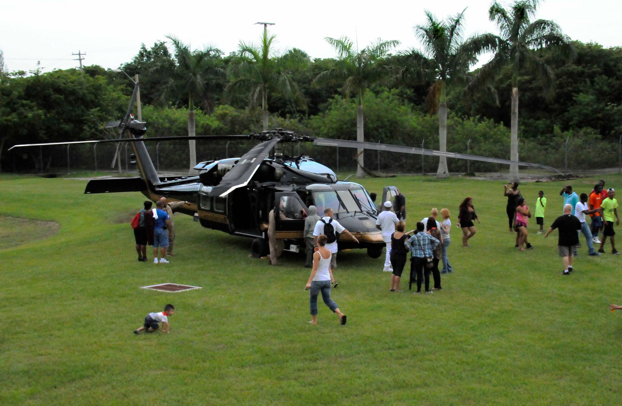 Members from the community gather around a Black Hawk helicopter from U. S. Customs and Boarder Protection.  The 482nd Fighter Wing held their 5th Annual Independence Day Celebration at Homestead Air Reserve Base, Fla., on July 4. (U.S. Air Force photo/ Senior Airmen Aja Heiden)
