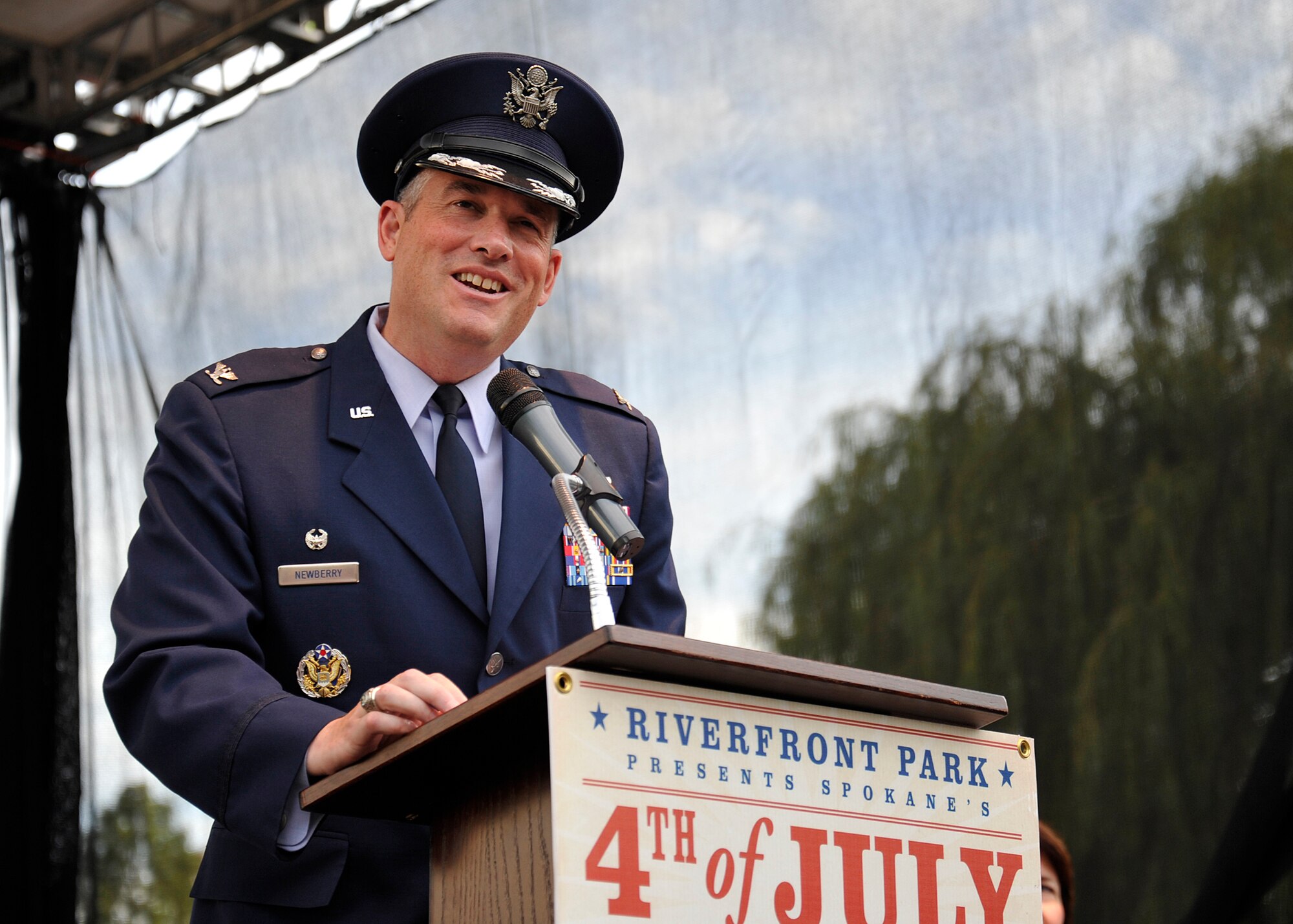 Col. Brian Newberry, 92nd Air Refueling Wing commander, speaks at the Riverfront Park 4th of July Celebration at Spokane, Washington, July 4, 2014. (U.S. Air Force photo by Staff Sgt. Michael Means/Released)