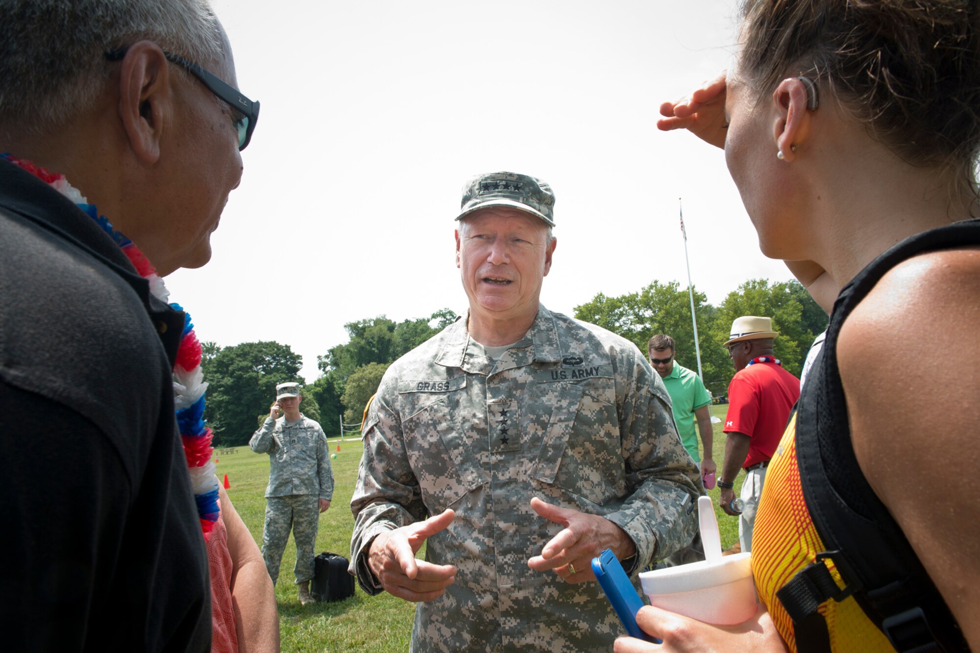 U.S. Army Gen. Frank J. Grass, chief of the National Guard Bureau, talks with attendees during the annual ANGRC picnic at Fort Hunt Park near Alexandria, Virginia July 3, 2014. The event provides an opportunity to build morale, teamwork and recognize the sacrifices and contributions of ANG families to the Total Force mission. (Air National Guard photo by Master Sgt. Marvin R. Preston/Released)