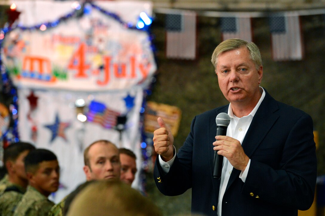 U.S. Sen. Lindsey Graham of South Carolina addresses U.S. service members on Bagram Airfield, Afghanistan, July 4, 2014. Graham and U.S. Sen. John McCain of Arizona made several stops in Afghanistan. McCain and Graham also had lunch with service members from the states they represent.