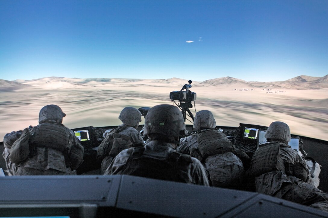U.S. Marines attached to Fox Co., 2nd Battalion, 3rd Marine Regiment demonstrate the Supporting Arms Virtual Trainer (SAVT) at Marine Corps Base Hawaii on Nov. 5, 2010. The SAVT is a Joint Terminal Attack Controller training system that is used to train for indirect fire, call for fire, and Type I, II, and III Close Air Support.  (U.S. Marine Corps photo by Lance Cpl. Jody Lee Smith/Released)
