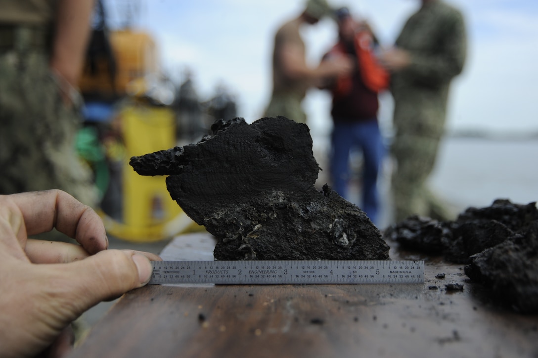 A piece of the CSS Georgia ironclad recovered from the Savannah River, Nov. 12, 2013 by divers with the U.S. Navy and archaeologists with the U.S. Army Corps of Engineers.