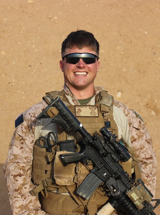 Sergeant Thomas Z. Spitzer, professionally instructed gunman, Scout Sniper Platoon, 1st Battalion, 7th Marine Regiment, poses for a photo shortly after arriving in Helmand province, Afghanistan, March 20, 2014. Spitzer, a 23-year-old native of New Braunfels, Texas, was killed while conducting combat operations, June 25, 2014.