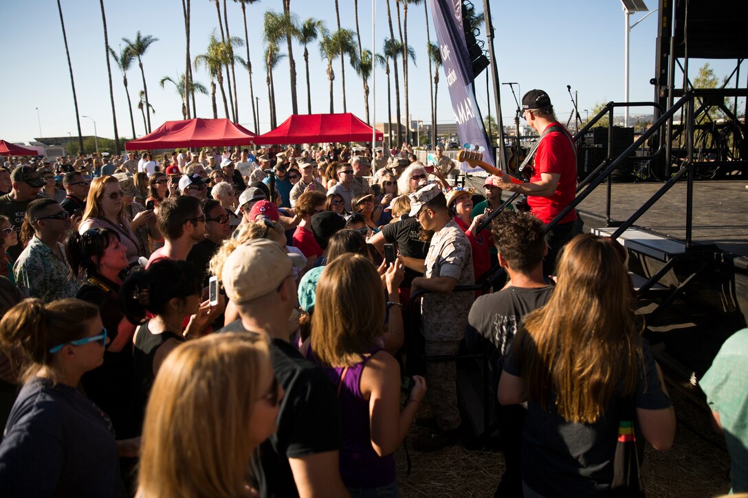 MARINE CORPS AIR STATION MIRAMAR, Calif. – Gary Sinise and the Lt. Dan Band perform live for service members and families aboard Marine Corps Air Station Miramar, Calif., July 7. Their performance was brought together through the organization of noncommissioned officers from Marine Aircraft Group (MAG) 16 and Marine Corps Community Services.