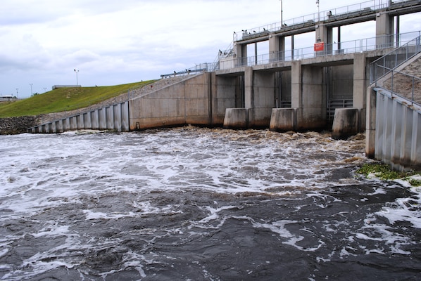 Water flows from Lake Okeechobee into the Caloosahatchee River at the Moore Haven lock and dam. Flows during 2014 have been much closer to normal following heavy precipitation at the beginning of the 2013 wet season. 