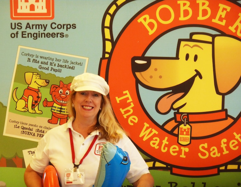 Jamie Wagner, a volunteer with the Army Corps of Engineers’ water safety program, teaches students to “Throw, don’t go!”