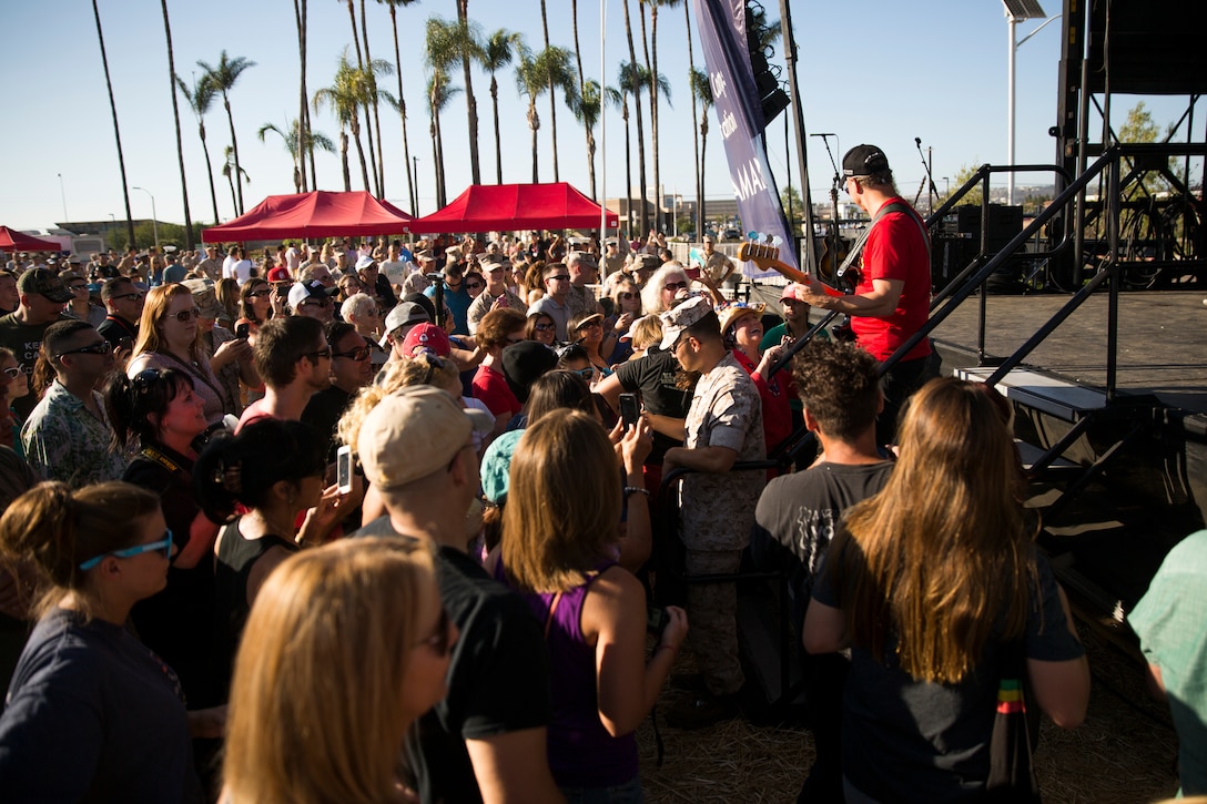 MARINE CORPS AIR STATION MIRAMAR, Calif. – Gary Sinise and the Lt. Dan Band perform live for service members and families aboard Marine Corps Air Station Miramar, Calif., July 7. Their performance was brought together through the organization of noncommissioned officers from Marine Aircraft Group 16. 