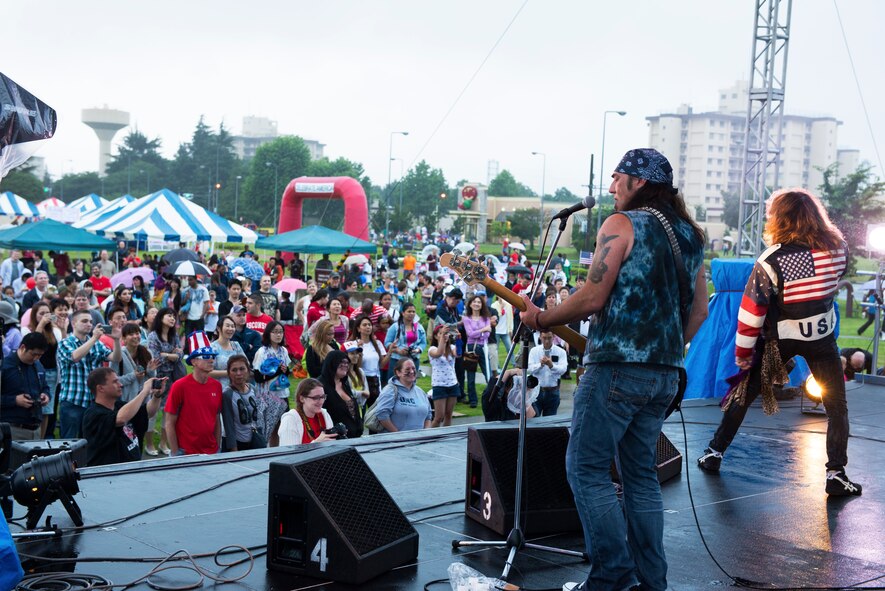 Bon Jovi tribute band Slippery When Wet performs during Celebrate America, a daylong 4th of July event at Yokota Air Base, Japan.  The band played a number of songs and ended their performance with a rendition of the “Star-Spangled Banner”, followed by a fireworks display over Yokota’s airfield.  (U.S. Air Force photo by Tech. Sgt. Christopher Marasky)