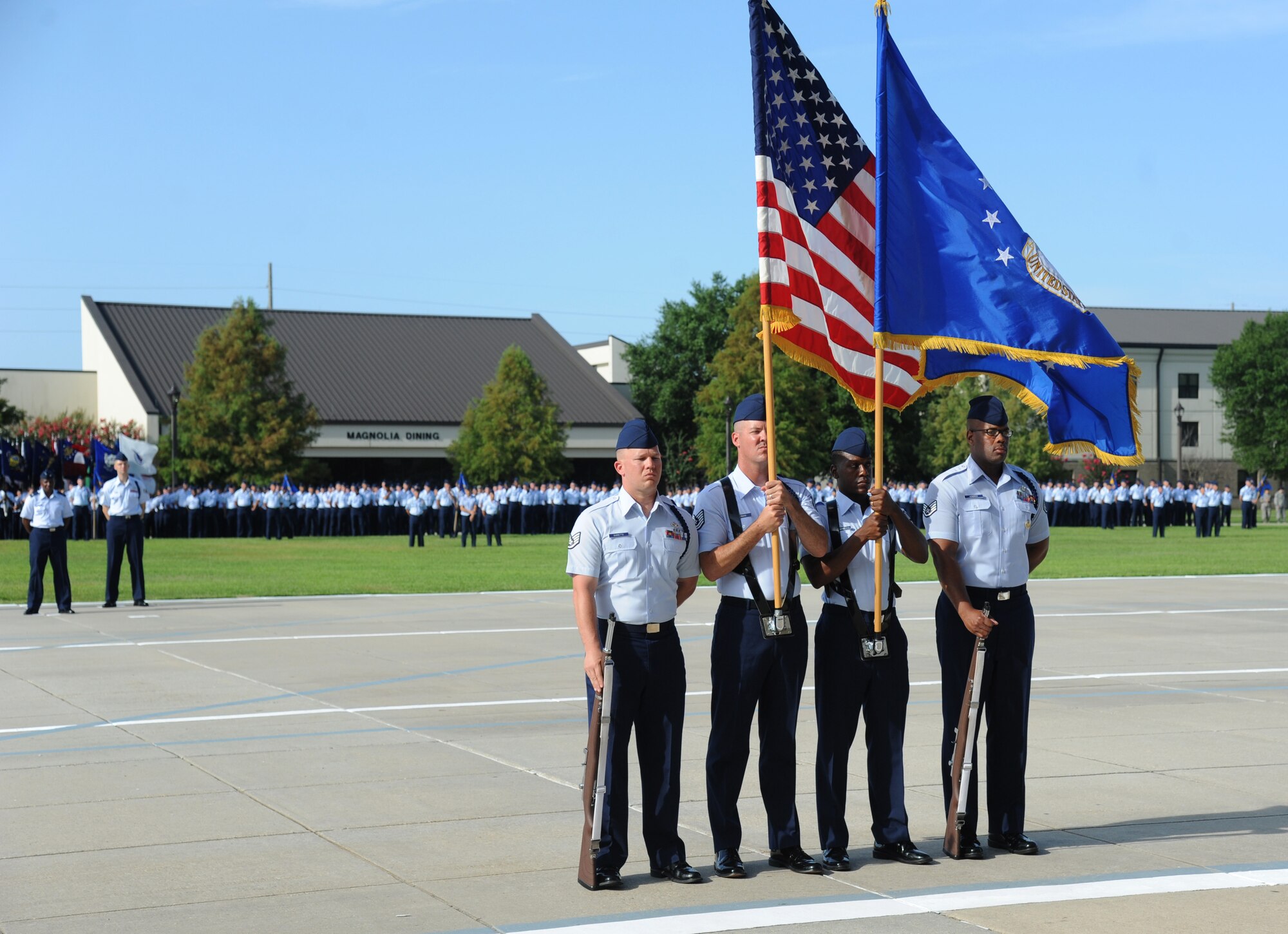 Military Training Leaders present the colors during the 2nd Air Force change of command ceremony July 3, 2014, at Keesler Air Force Base, Miss.  Brig. Gen. Mark Brown assumed command at the ceremony from Maj. Gen. Leonard Patrick. Brown was previously the Financial Management director, Headquarters Air Force Material Command at Wright-Patterson Air Force Base, Ohio. Patrick is headed to Randolph Air Force Base, Texas, where he will become the AETC vice commander.  (U.S. Air Force photo by Kemberly Groue)