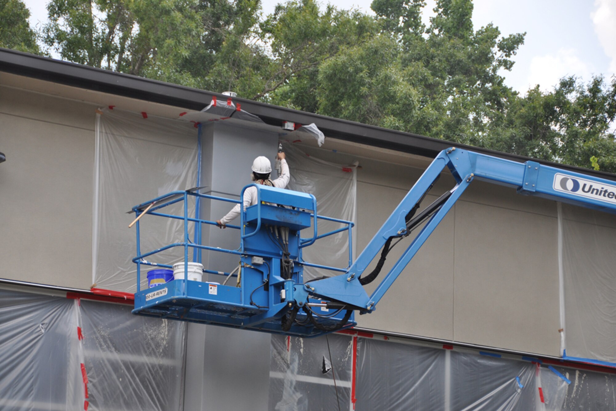 Contractors from HCR Construction perform renovations to the Dobbins Air Reserve Base Fitness Center July 7, 2014. Barring any delays, the center is expected to re-open mid Nov. 2014. (U.S. Air Force photo/James Branch)