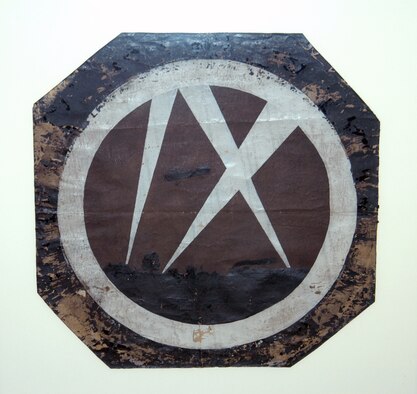 This squadron was organized at Kelly Field, Texas, on June 14, 1917, from Company E, Provisional Aviation School Squadron. This squadron was an Army Observation Squadron that performed long-range strategic night reconnaissance over the Western Front in France in 1918. The squadron’s insignia is an aircraft flying at night within the search area of three search lights forming the Roman numerals IX (9). (U.S. Air Force photo)