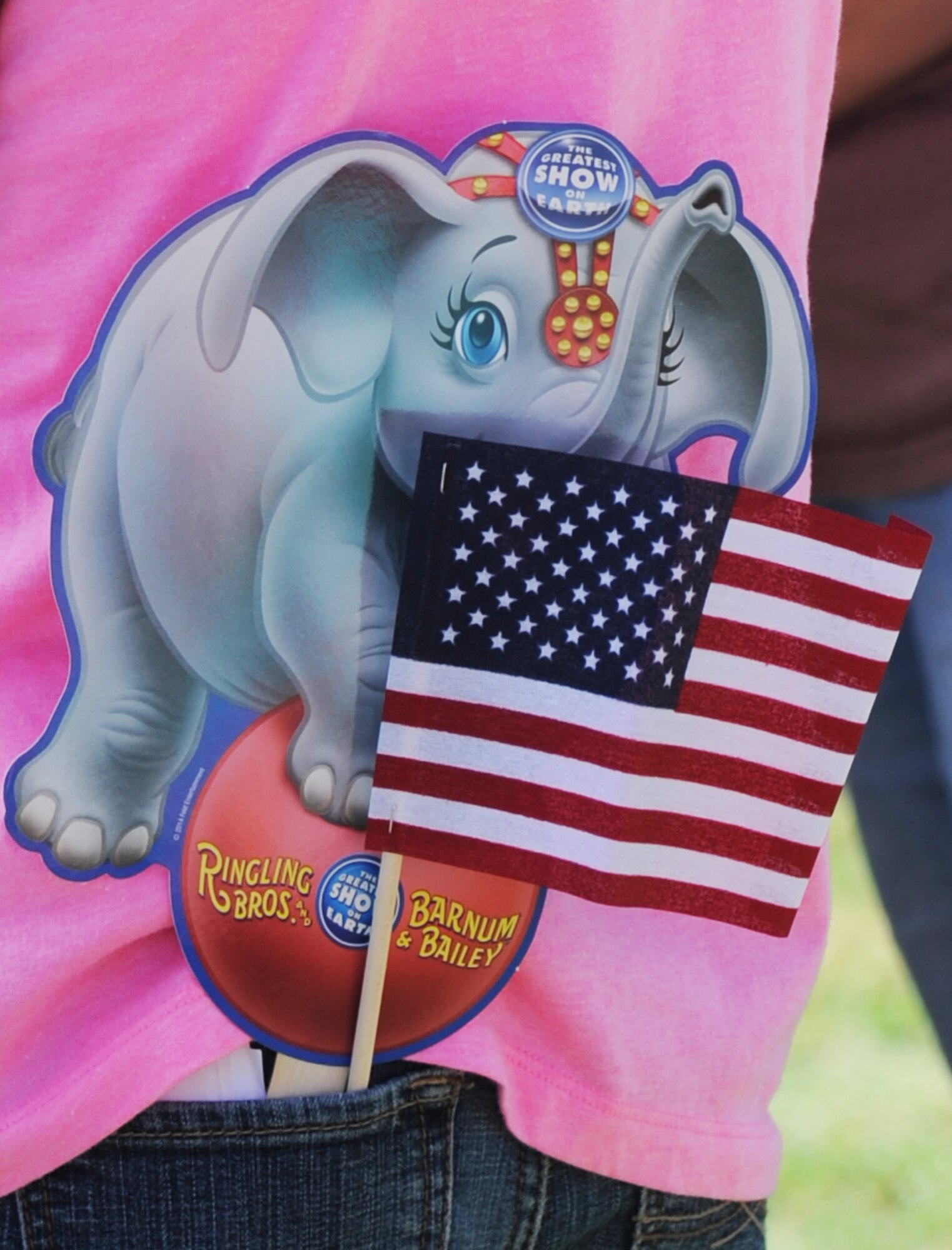 Keesler deployed families watch a performance by elephants during “Pachyderm and Popsicles,” hosted by the Ringling Brothers Circus July 3, 2014, at the Mississippi Coast Coliseum.  The Circus also joined with the Keesler Youth Center to present a banner decorated with Keesler kids’ hand prints and an elephant footprint to the Armed Forces Retirement Home July 2. (U.S. Air Force photo by Kemberly Groue)