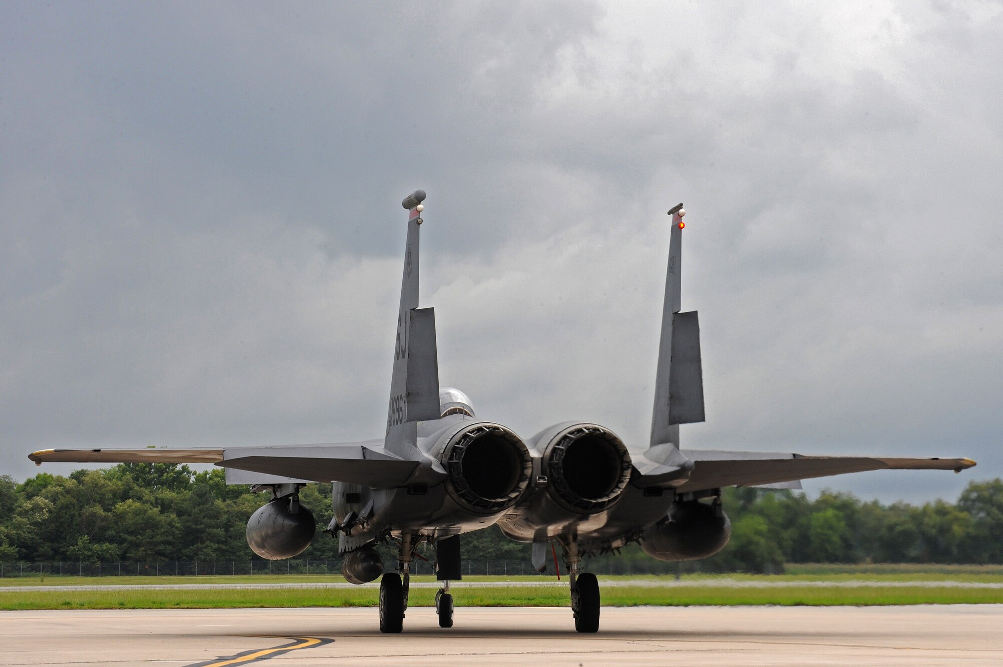 An F-15E Strike Eagle taxis on the flight line July 3, 2014, at Seymour Johnson Air Force Base, N.C. More than 50 Strike Eagle aircraft were repositioned to Wright-Patterson Air Force Base, Ohio, as a precautionary measure to avoid potential damage from high winds associated with Hurricane Arthur. (U.S. Air Force photo/Airman 1st Class Aaron J. Jenne)